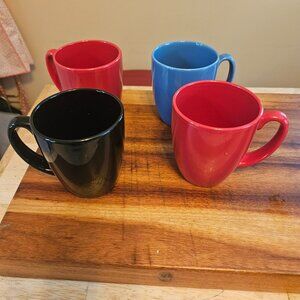Corelle stoneware mugs 2 red 1 black one blue